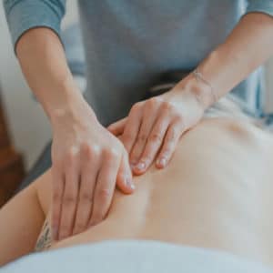 A pain patient gets a massage.