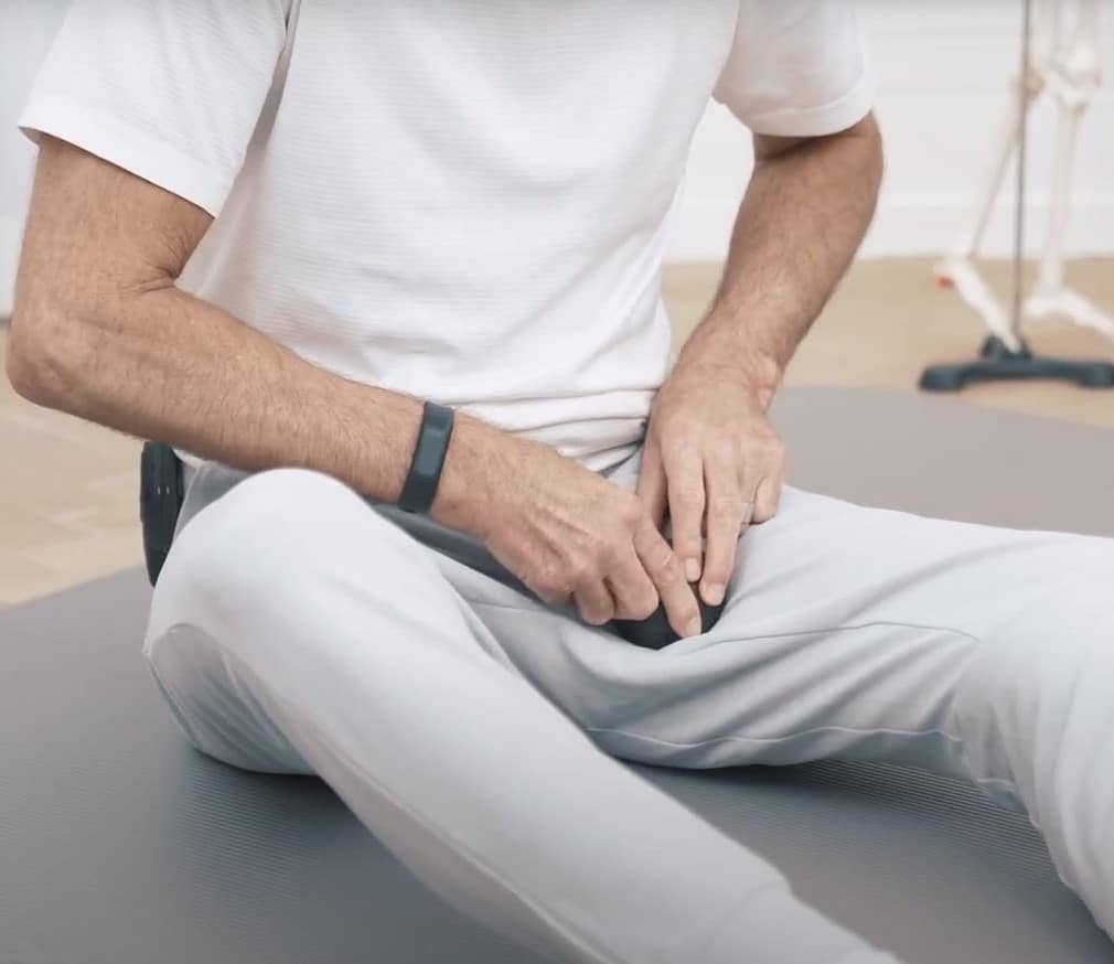 Roland massages the thigh area.