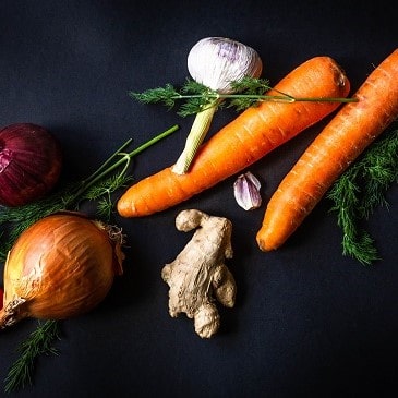 image with carrots, garlic, onion and ginger