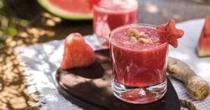 image of a glass of watermelon juice with freshly grated ginger