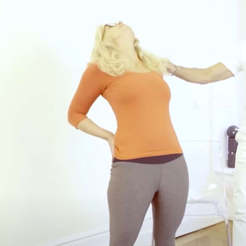 Ina demonstrates a stretch for ankylosing spondylitis.