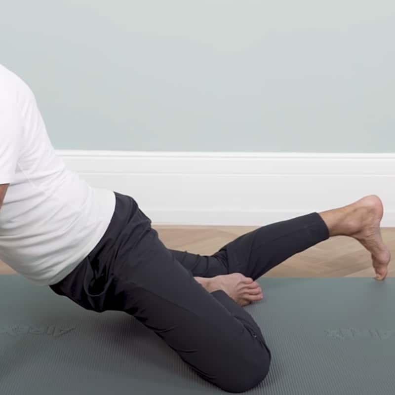 Roland demonstrates full body stretch exercise 1.