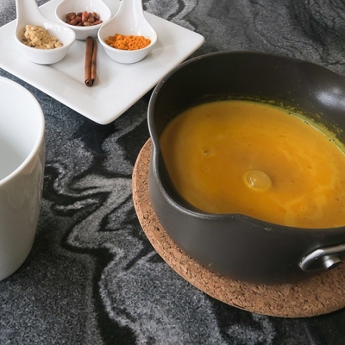 image of milk and turmeric in pan