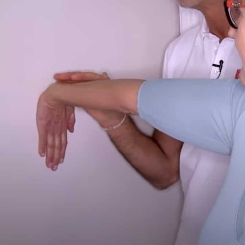 Ina demonstrates tennis elbow exercise 1.