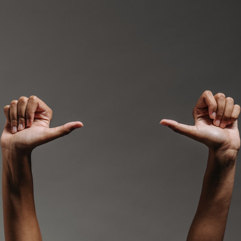 Picture of two hands giving a thumbs up.