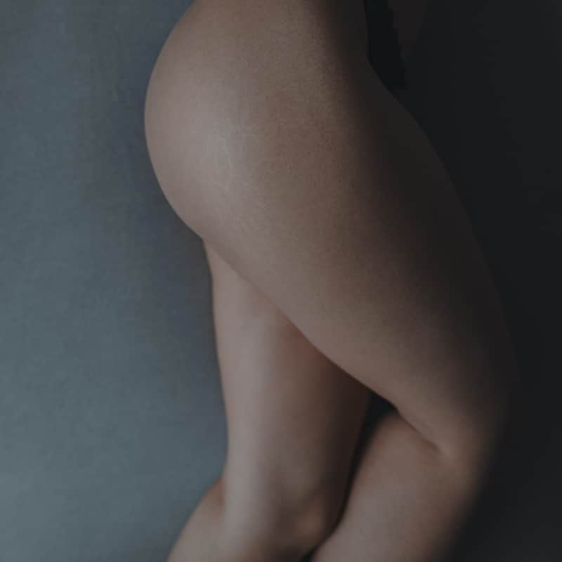 Close up of the side of two legs.