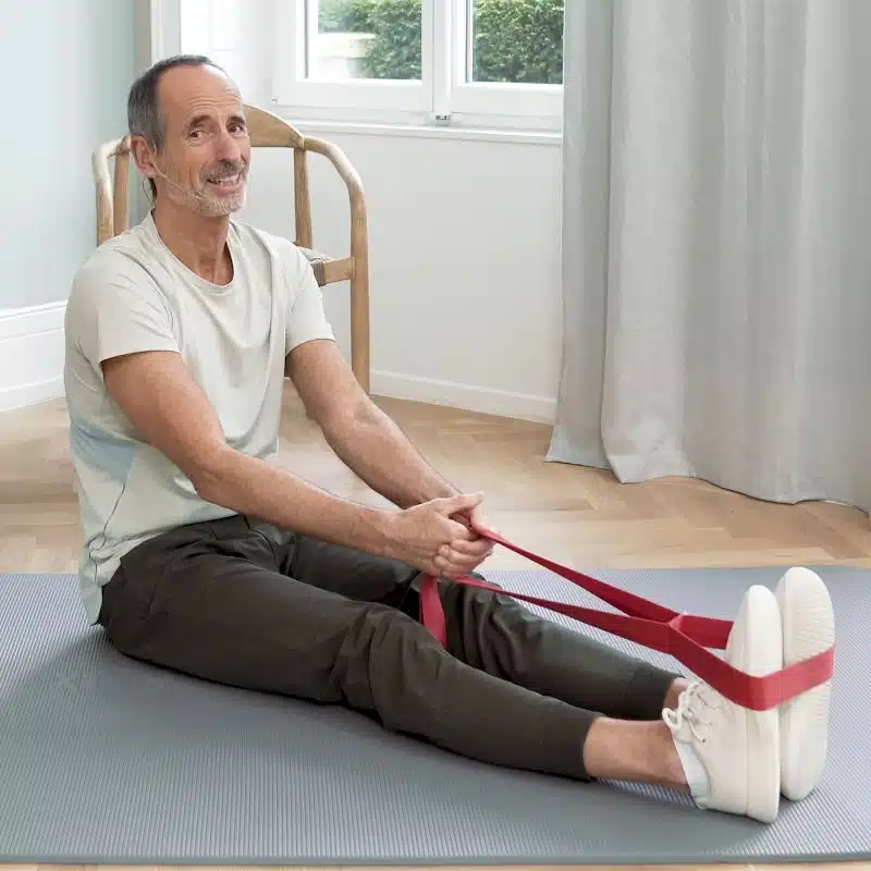 Liebscher & Bracht Dehnübung für unteren Rücken mit Theraband