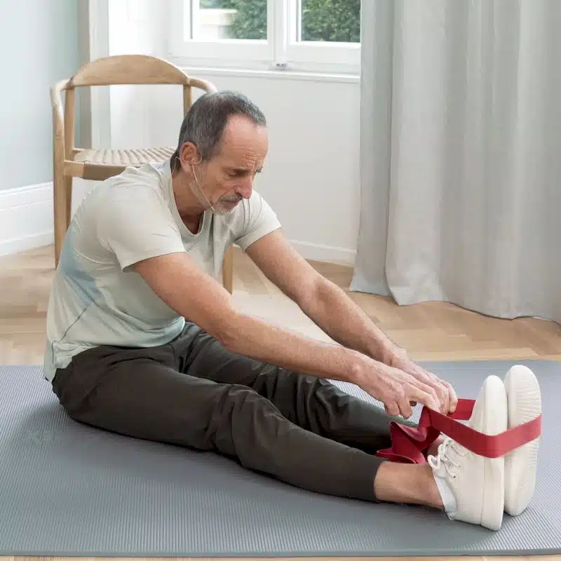 Liebscher & Bracht Dehnübung für unteren Rücken mit Theraband